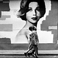 A couple stroll in Milan’s Via Monte Napoleone in 1962  Paolo di Paolo.jpg